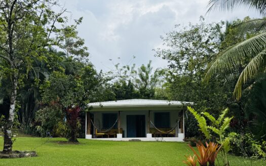 Home and property with the ultimate location steps away from the "Rio Claro" river and "the Point" surf spot